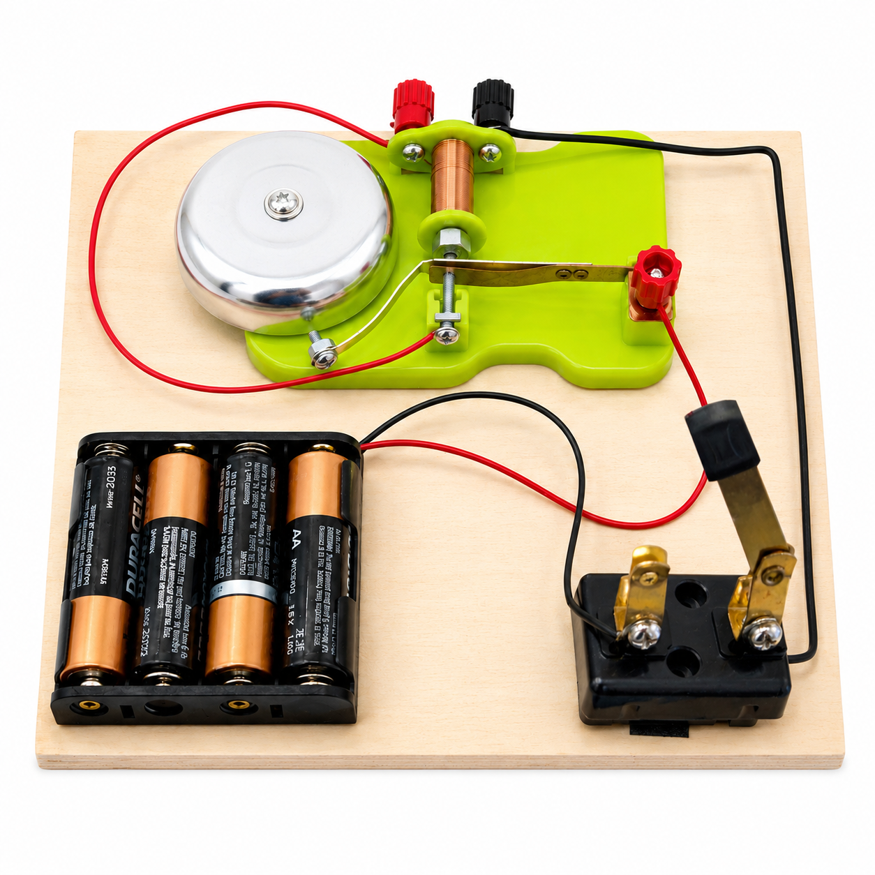 Assembled electric bell project on a wooden base