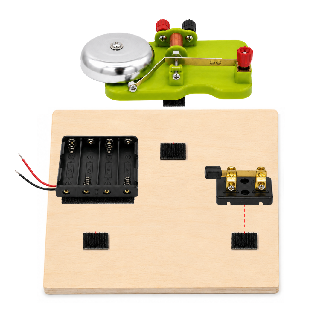 Velcro pieces placed on the wooden base to mount the bell at the top, the battery holder at the bottom left, and the knife switch at the bottom right