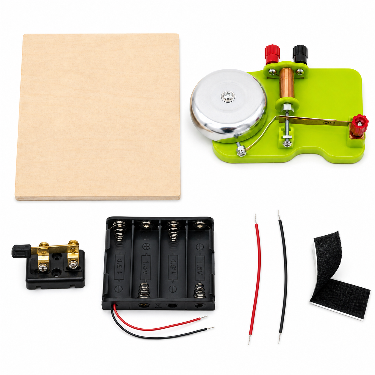 Electric bell kit parts laid out: wooden base, electromagnetic bell, knife switch, battery holder with wires, two additional wires, and Velcro tape