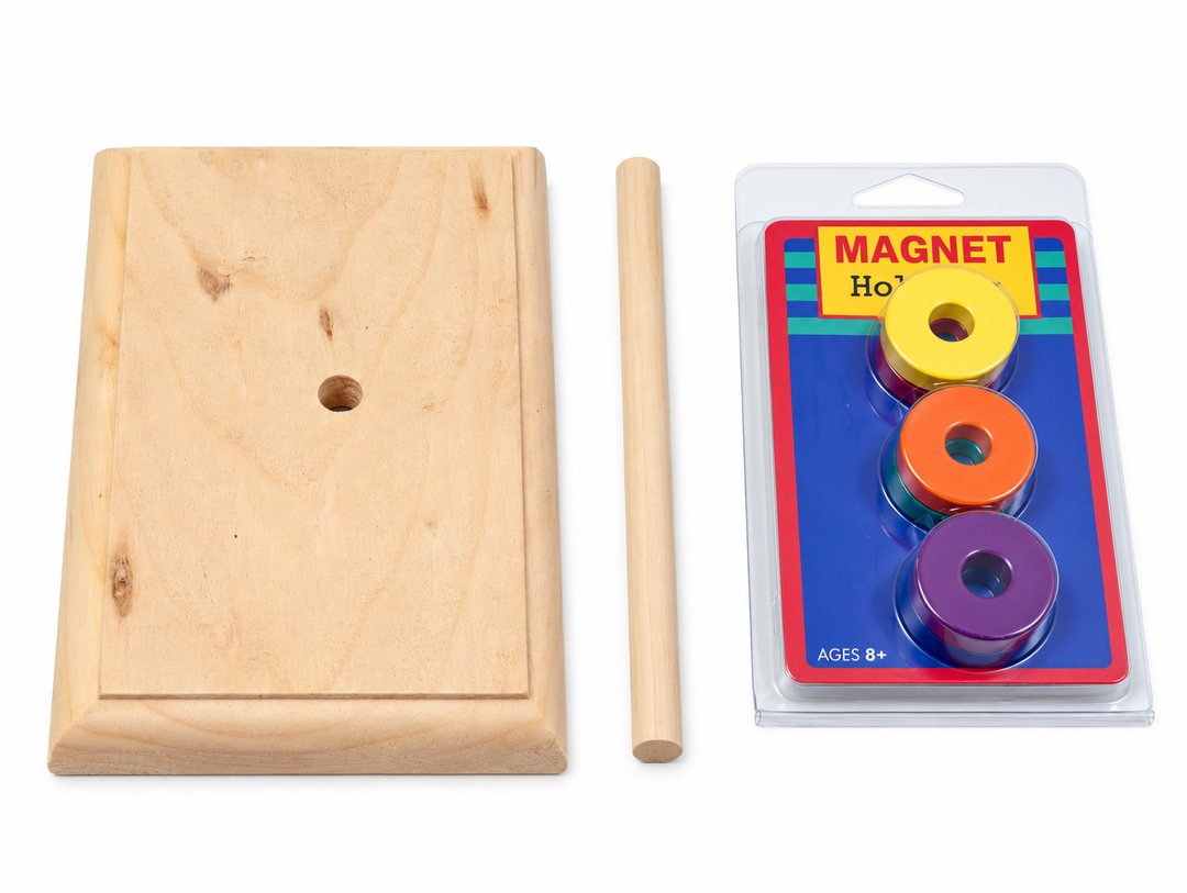 Kit parts: wooden base with a center hole, wooden dowel and a pack of colored ceramic ring magnets