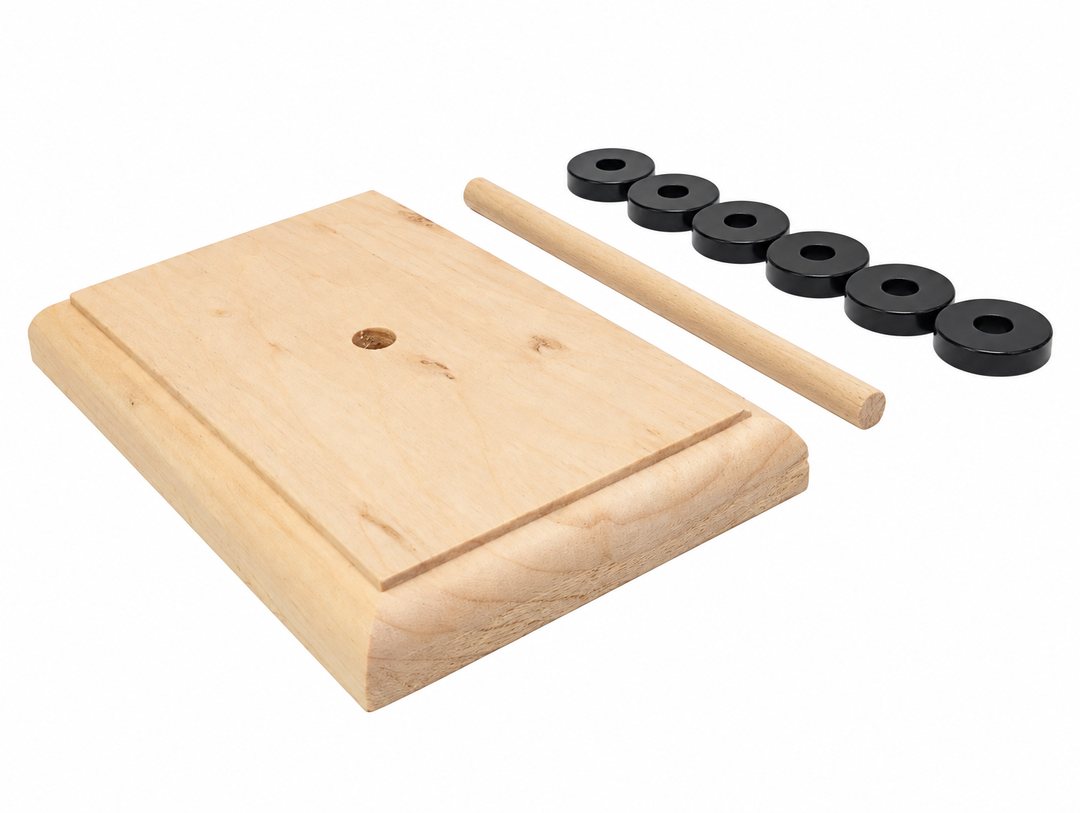Kit parts: wooden base with a center hole, wooden dowel and six black ceramic ring magnets