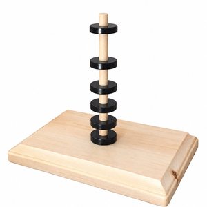 Floating Rings Science Set (Black Magnets) (KITFRB): Six black ring magnets floating on a wooden dowel, rectangular wooden base