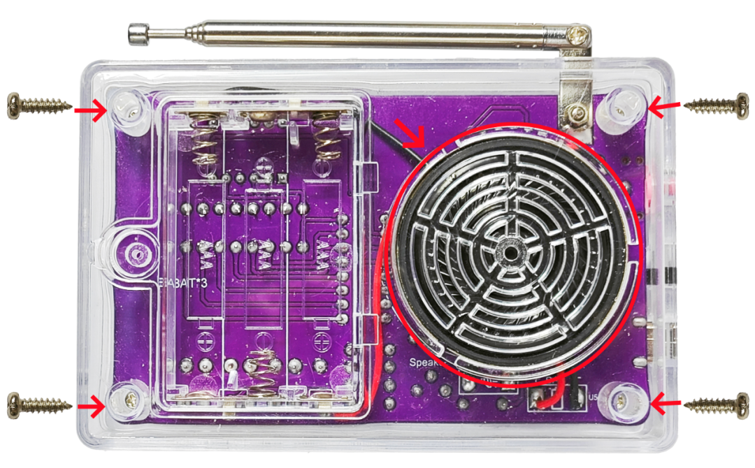 Fitting the speaker into its slot and closing the case with self-tapping screws